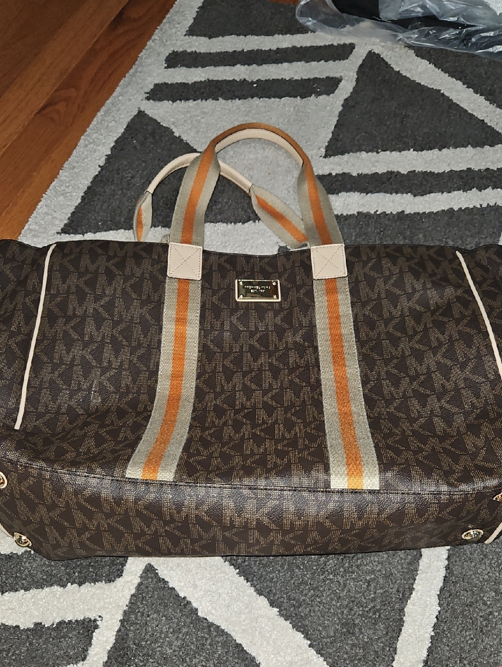 Michael Kors Brown Monogram Duffel with Orange-Trim Straps